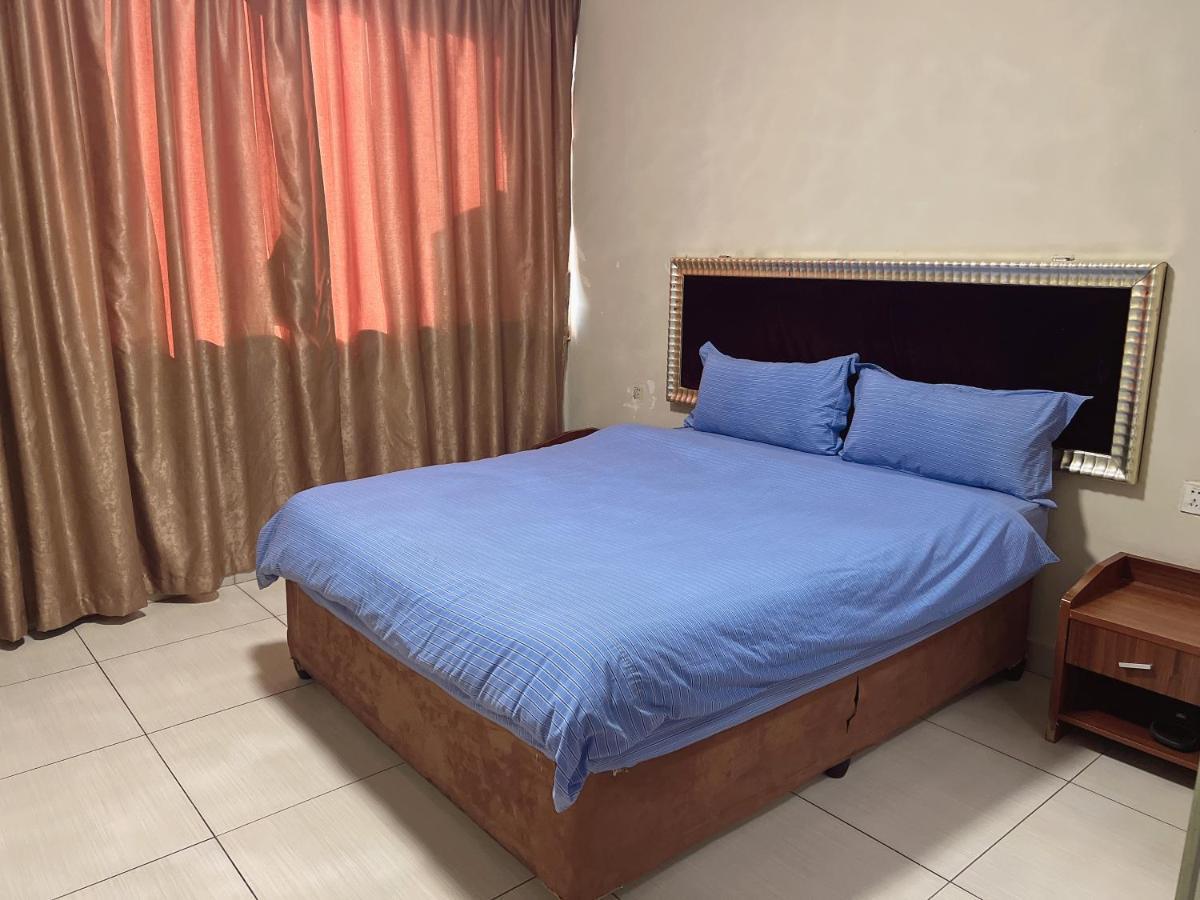 Shengtang Business Hotel Johannesburg Buitenkant foto