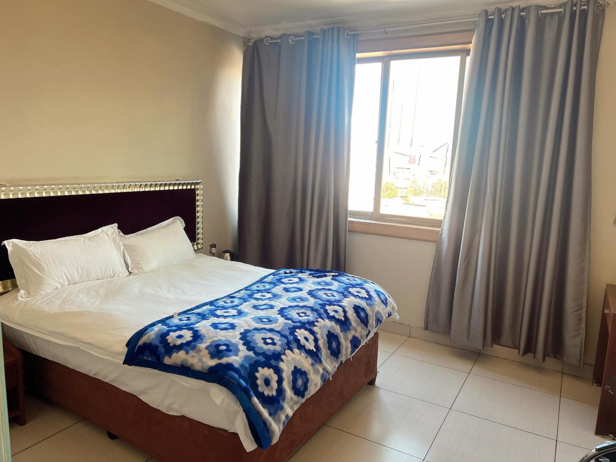 Shengtang Business Hotel Johannesburg Buitenkant foto