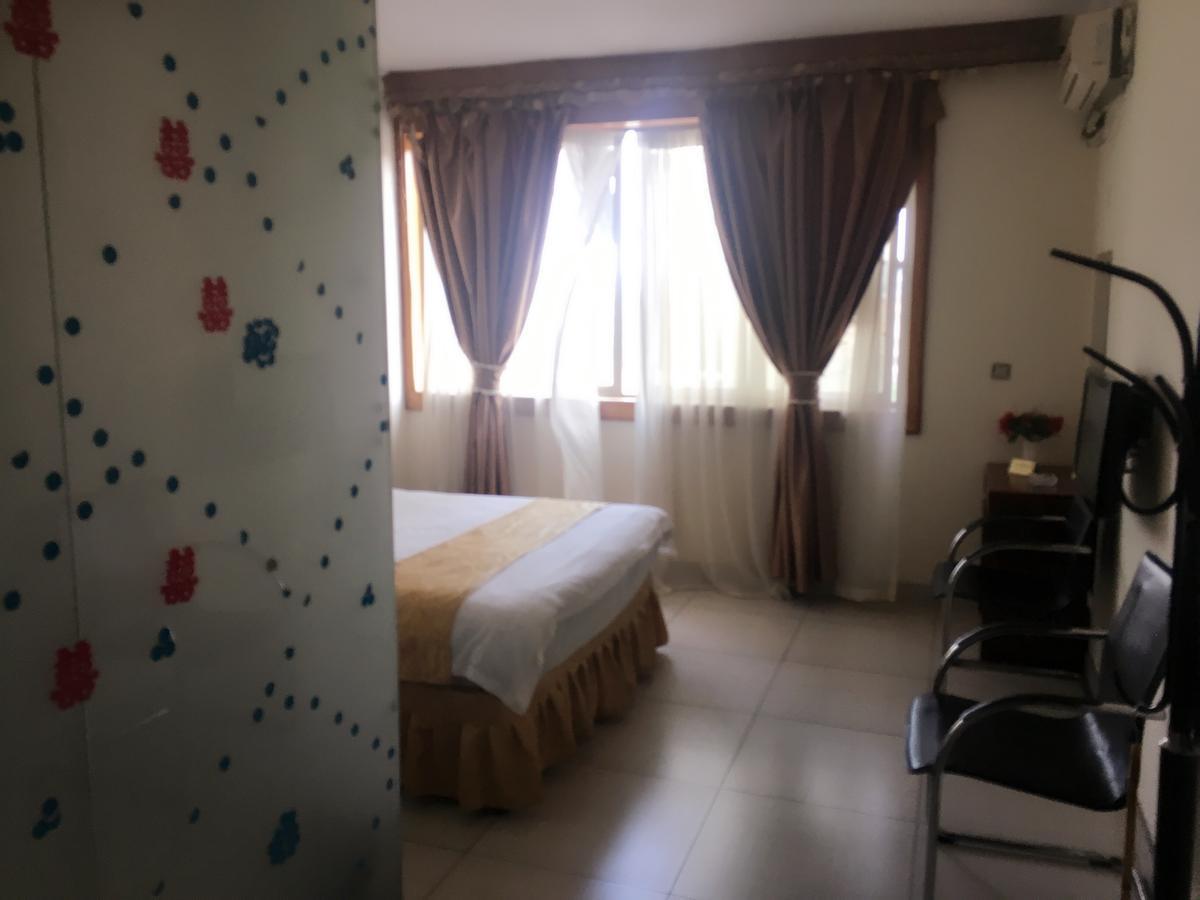 Shengtang Business Hotel Johannesburg Buitenkant foto